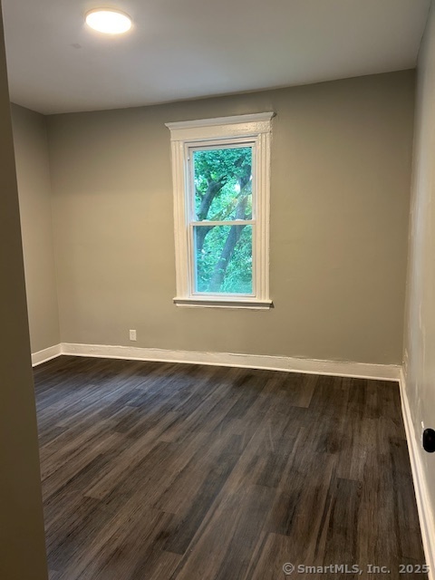 514 Winthrop Avenue New Haven, CT 06511 - Photo 9 of 17 a view of an empty room with wooden floor and a window