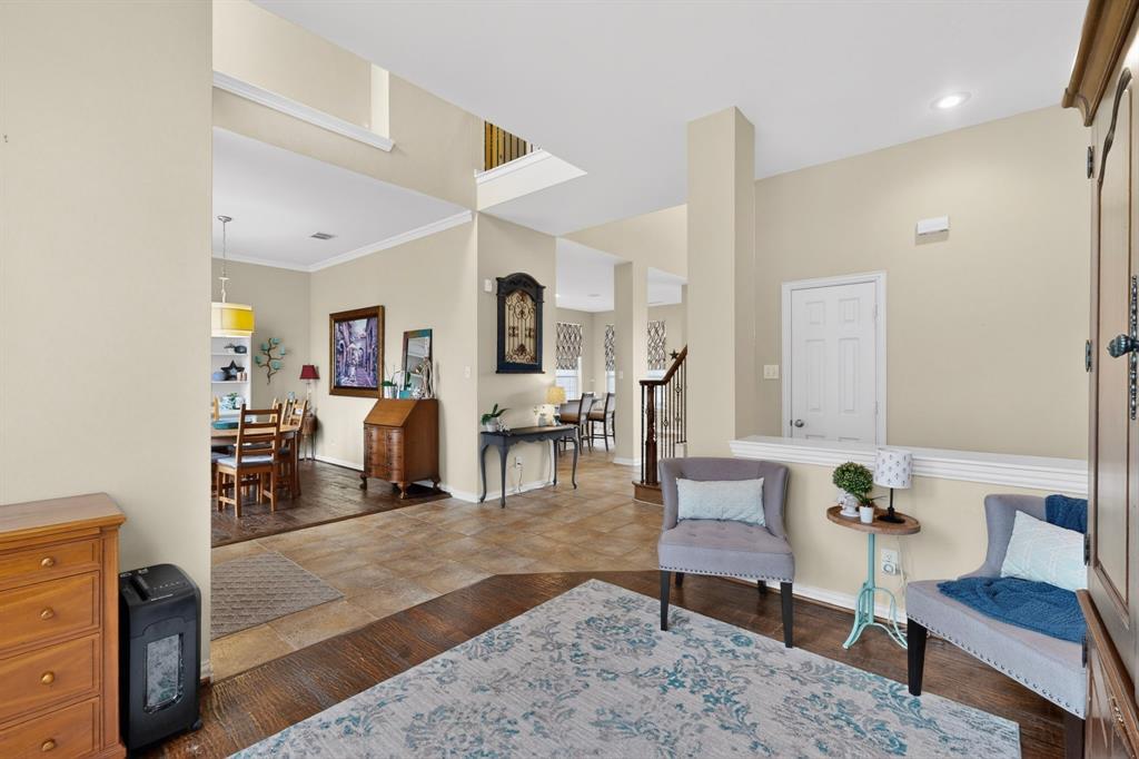 4004 White Porch Road Plano, TX 75024 - Photo 6 of 40 a living room with furniture and wooden floor