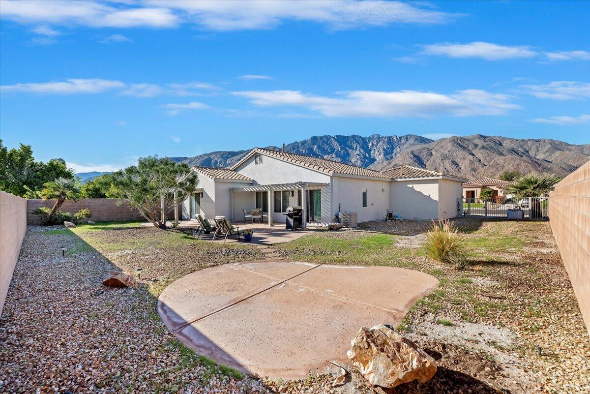 3982 Eastgate N Road Palm Springs, CA 92262 - Photo 50 of 55 a view of a house with a yard