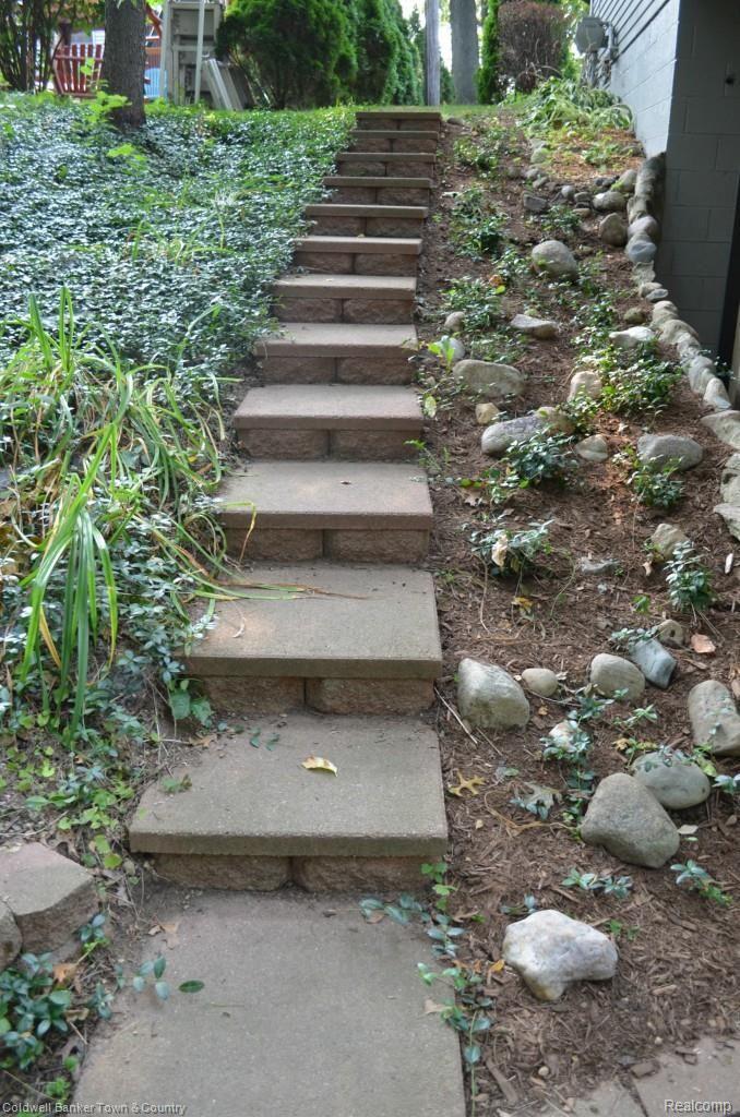 4997 Culver Road Brighton, MI 48114 - Photo 25 of 28 Charming Steps to Back Yard