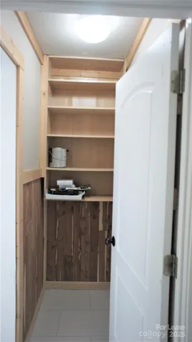 a refrigerator freezer sitting inside of a kitchen