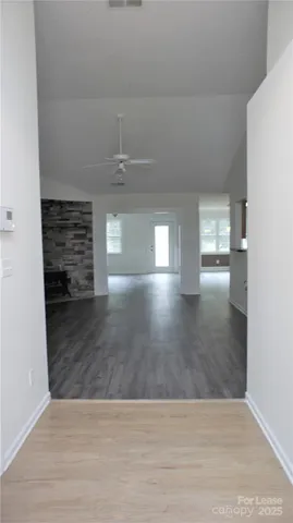 a view of an empty room and window