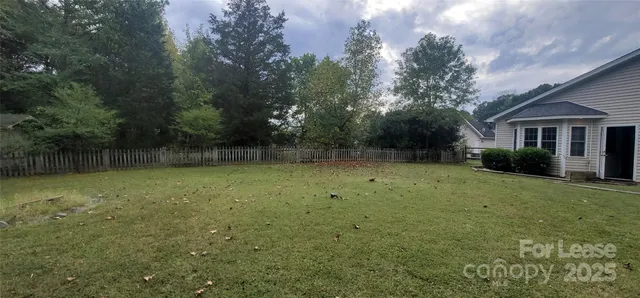 a view of a backyard with a garden