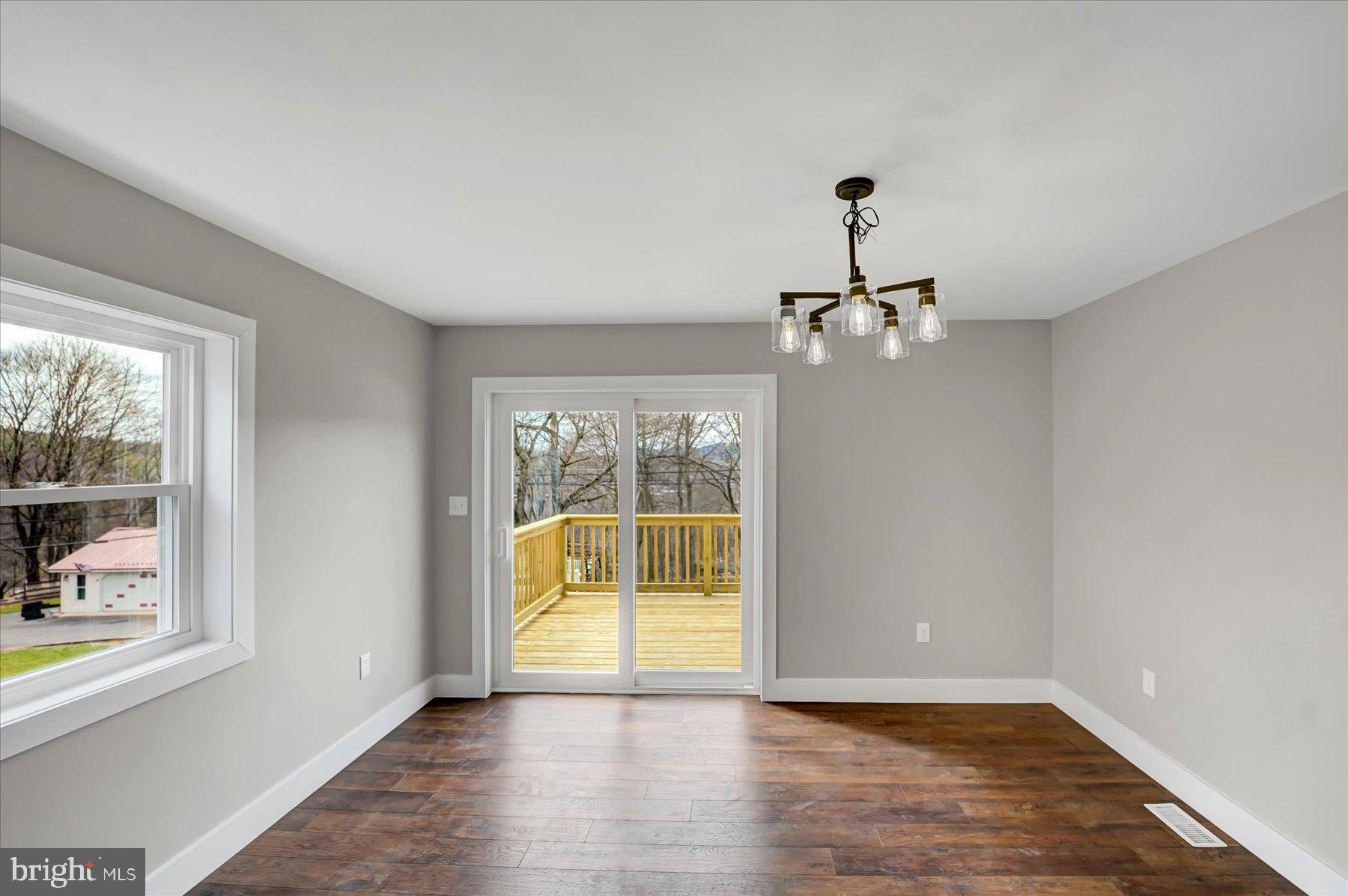 361 South Spring Street Bellefonte, PA 16823 - Photo 6 of 41 Bright and airy space with deck access.