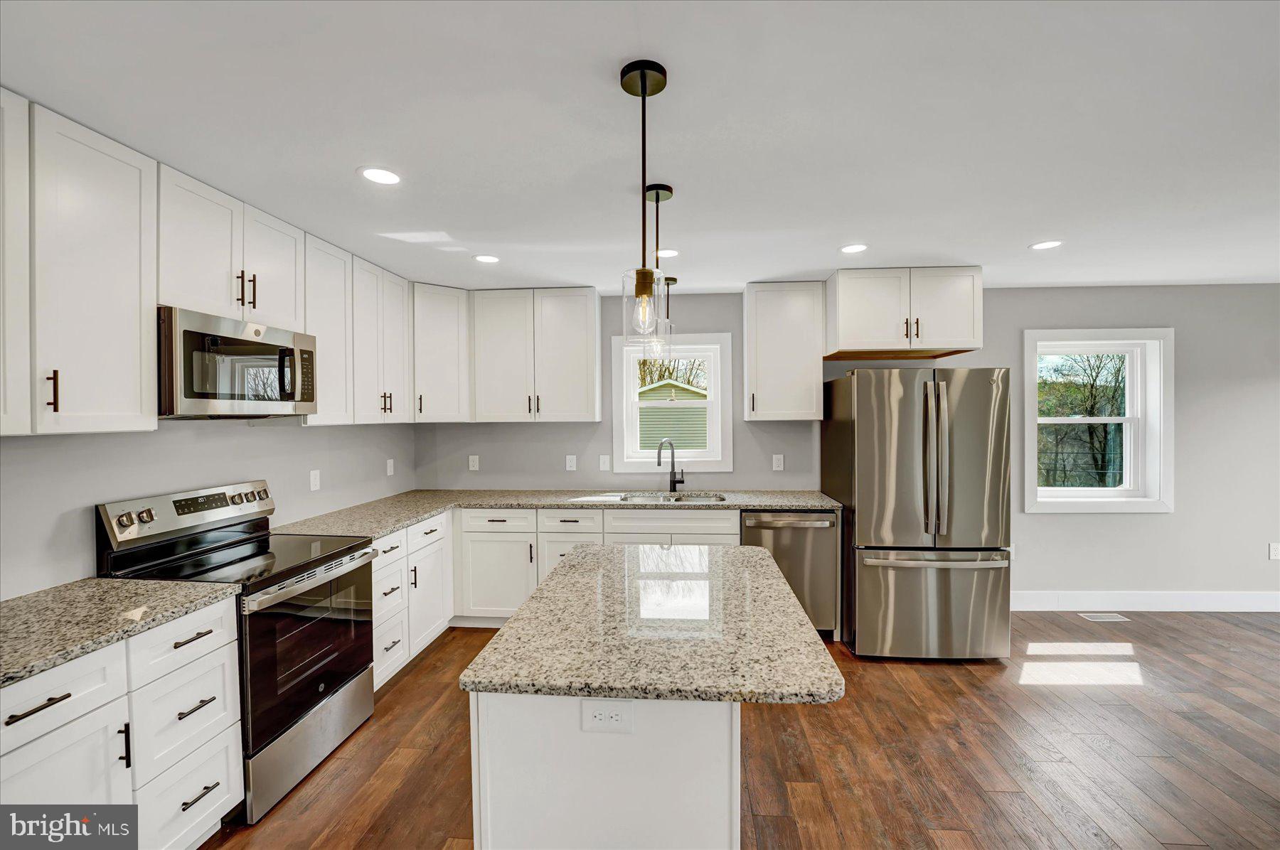 361 South Spring Street Bellefonte, PA 16823 - Photo 8 of 41 Modern kitchen with sleek finishes.