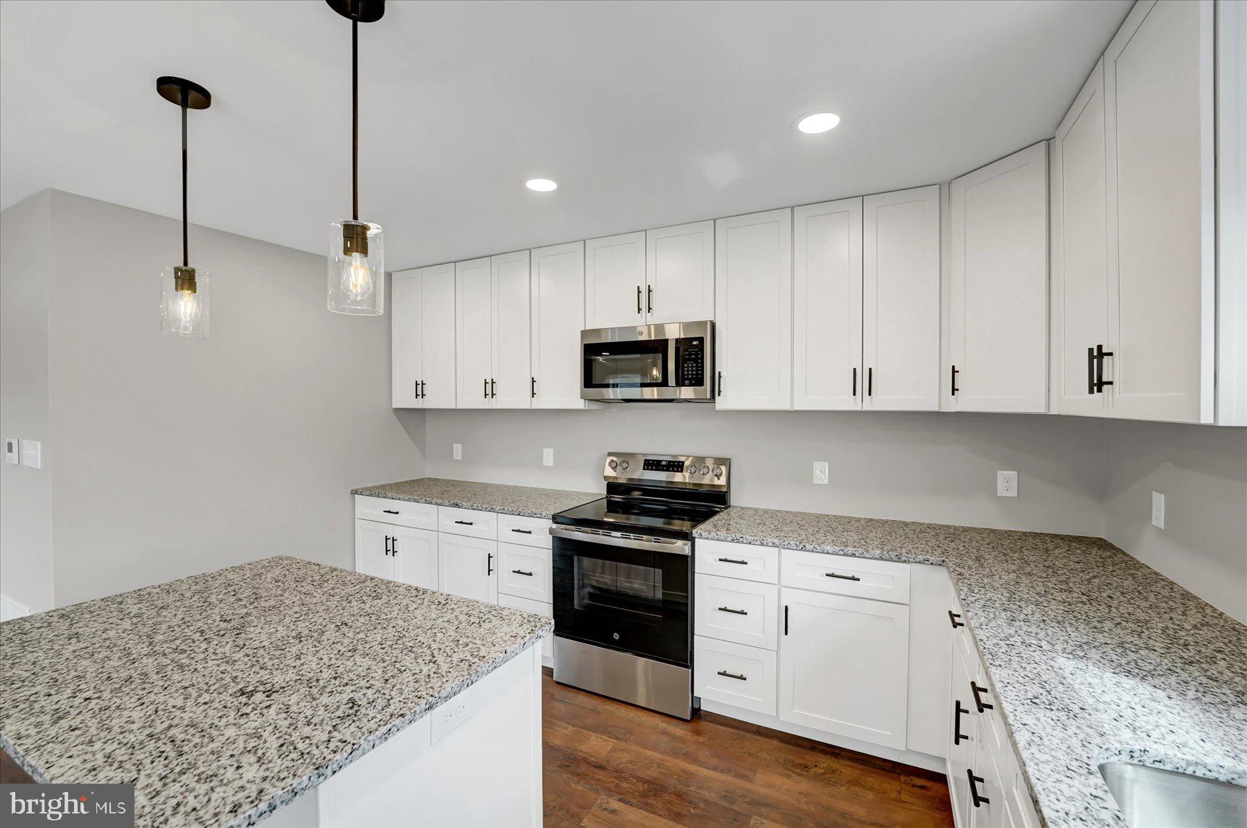 361 South Spring Street Bellefonte, PA 16823 - Photo 9 of 41 Modern kitchen with sleek finishes.