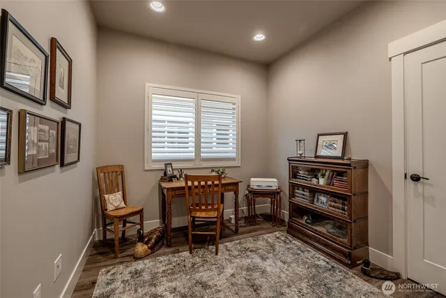 a view of a workspace with furniture