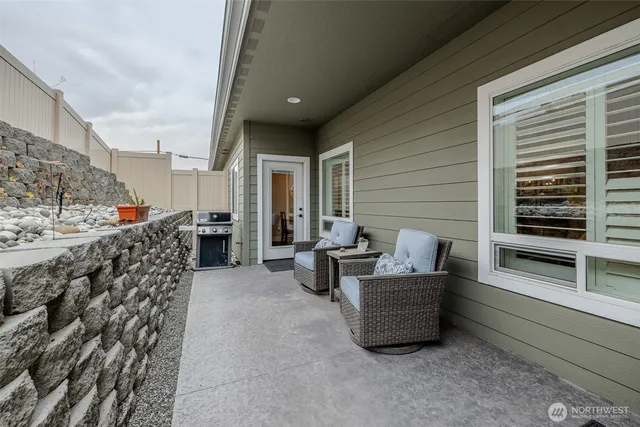 a bedroom with furniture and a window