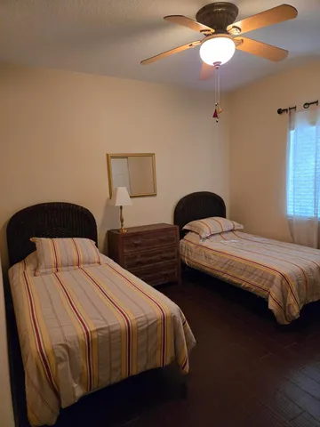 a view of an empty room and fire place