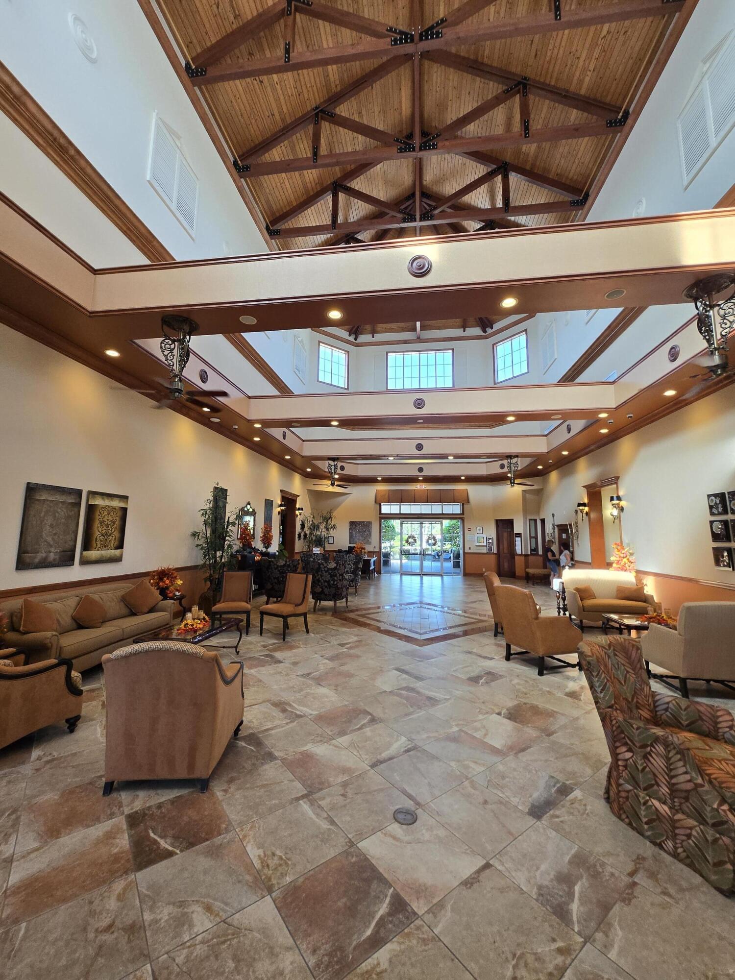 2297 Windjammer Way West Palm Beach, FL 33411 - Photo 38 of 56 a view of a room with gym equipment