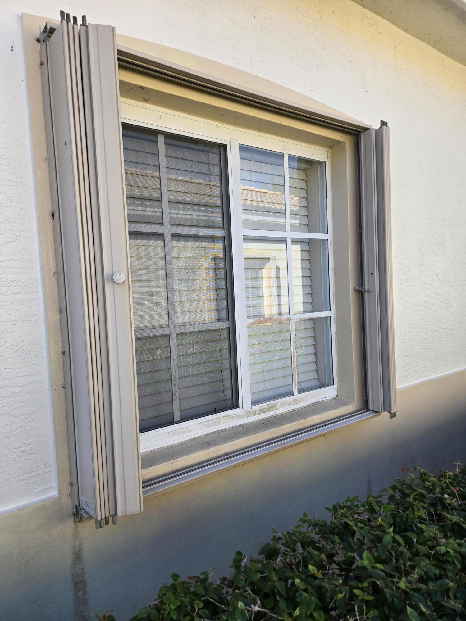 2297 Windjammer Way West Palm Beach, FL 33411 - Photo 4 of 56 a view of front door and porch