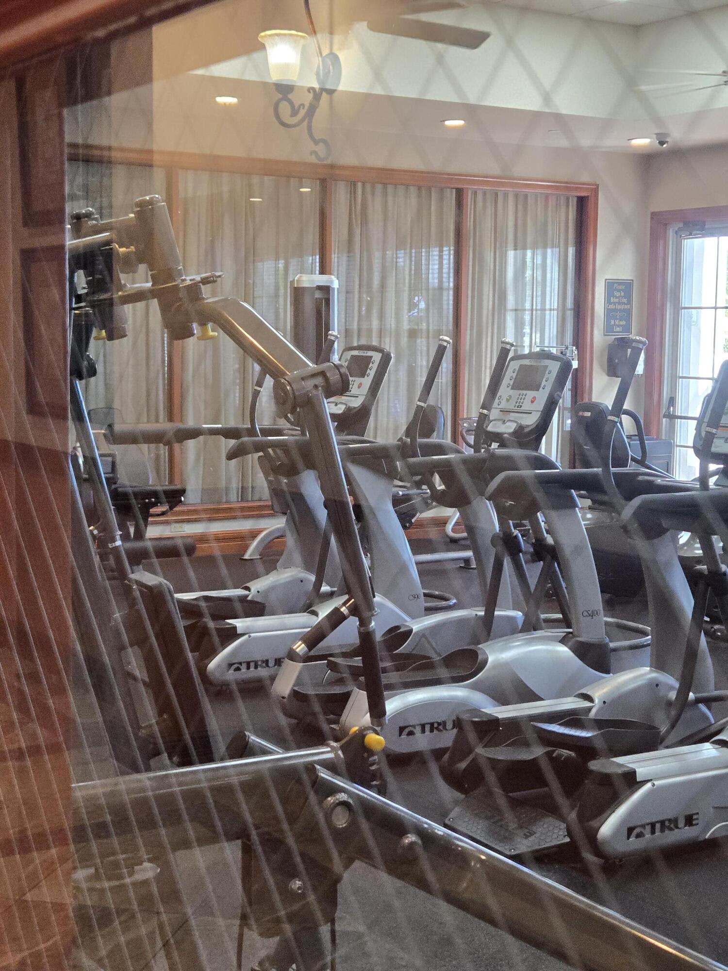 2297 Windjammer Way West Palm Beach, FL 33411 - Photo 41 of 56 a view of a room with gym equipment