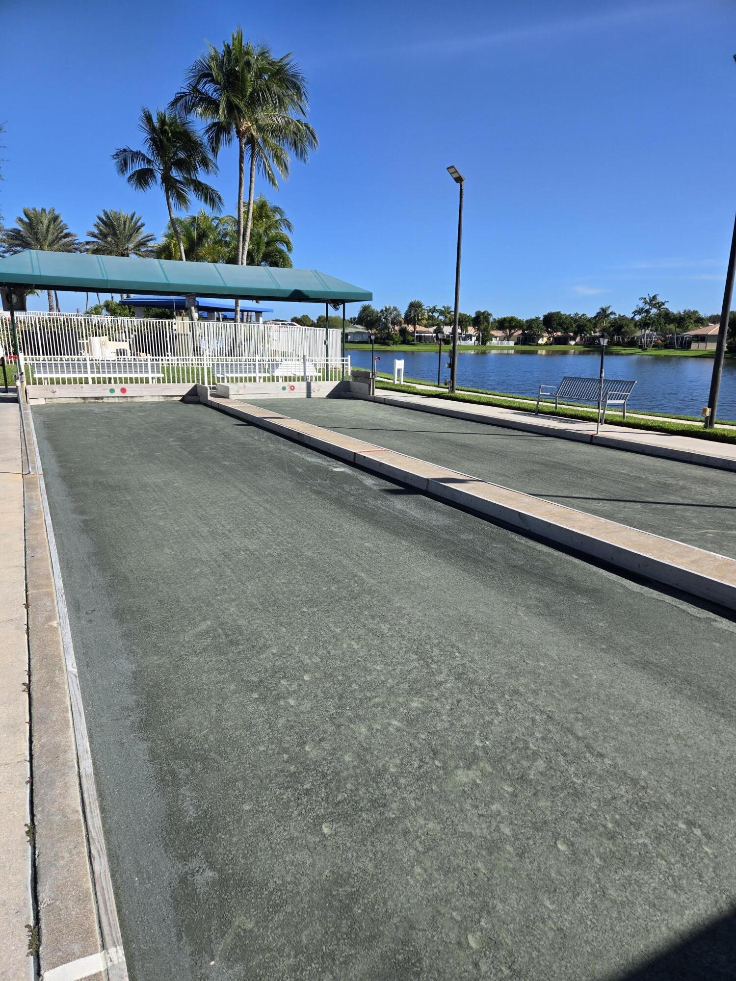 2297 Windjammer Way West Palm Beach, FL 33411 - Photo 55 of 56 a view of a balcony with sunset view