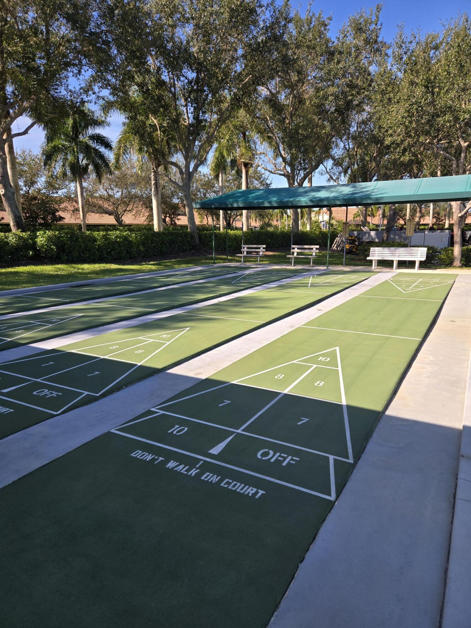 2297 Windjammer Way West Palm Beach, FL 33411 - Photo 56 of 56 a view of a tennis court