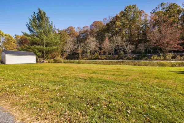 a view of a swimming pool and an outdoor space