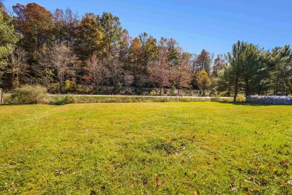 a view of a swimming pool and an outdoor space