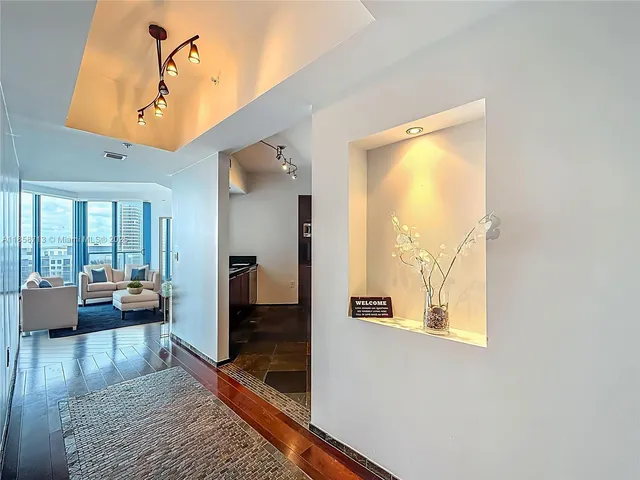 a very nice looking living room with a large window