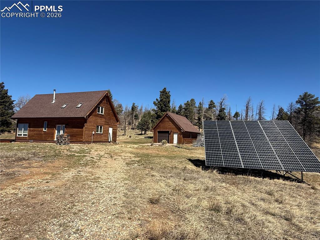450 Schierl Road Fort Garland, CO 81133 - Photo 12 of 40 a front view of a house with a yard