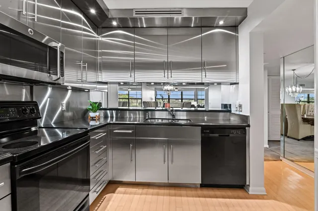 a kitchen with a stove and a microwave