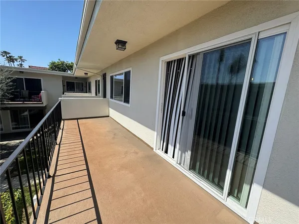 a view of a living room with a flat screen tv