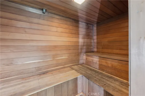 a bathroom with a shower and a sink