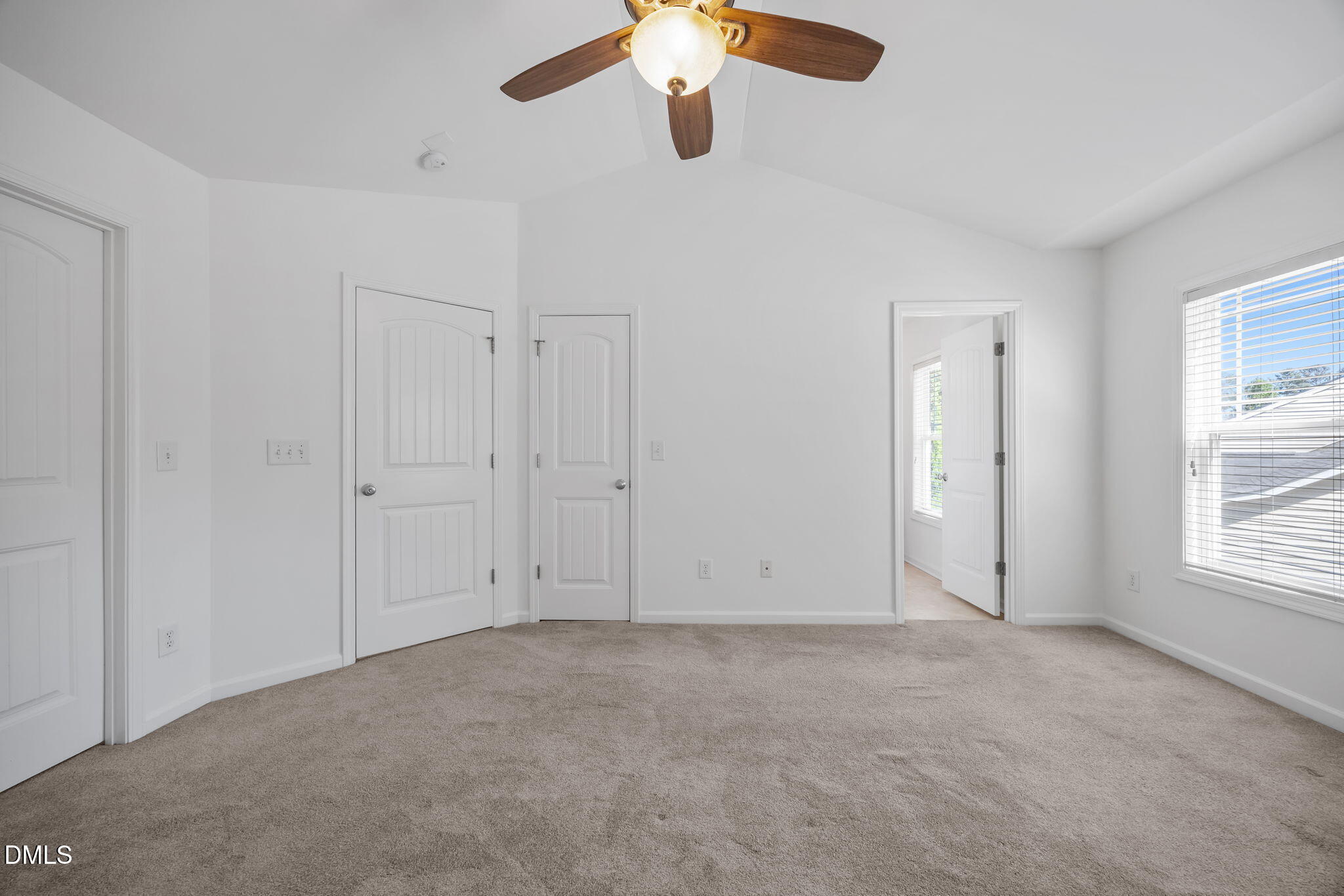 4724 Altha Street Raleigh, NC 27606 - Photo 28 of 43 an empty room with chandelier fan