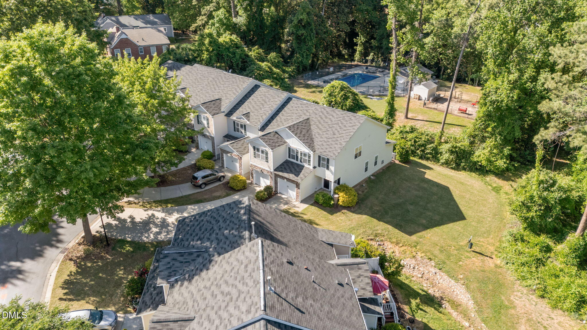 4724 Altha Street Raleigh, NC 27606 - Photo 40 of 43 an aerial view of a house with a yard and trees