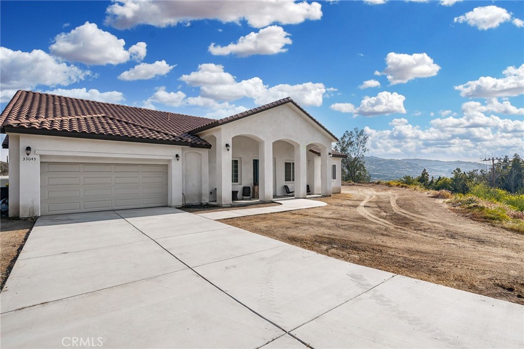 33045 Meyer Road Nuevo, CA 92567 - Photo 1 of 1 a view of a house with a patio