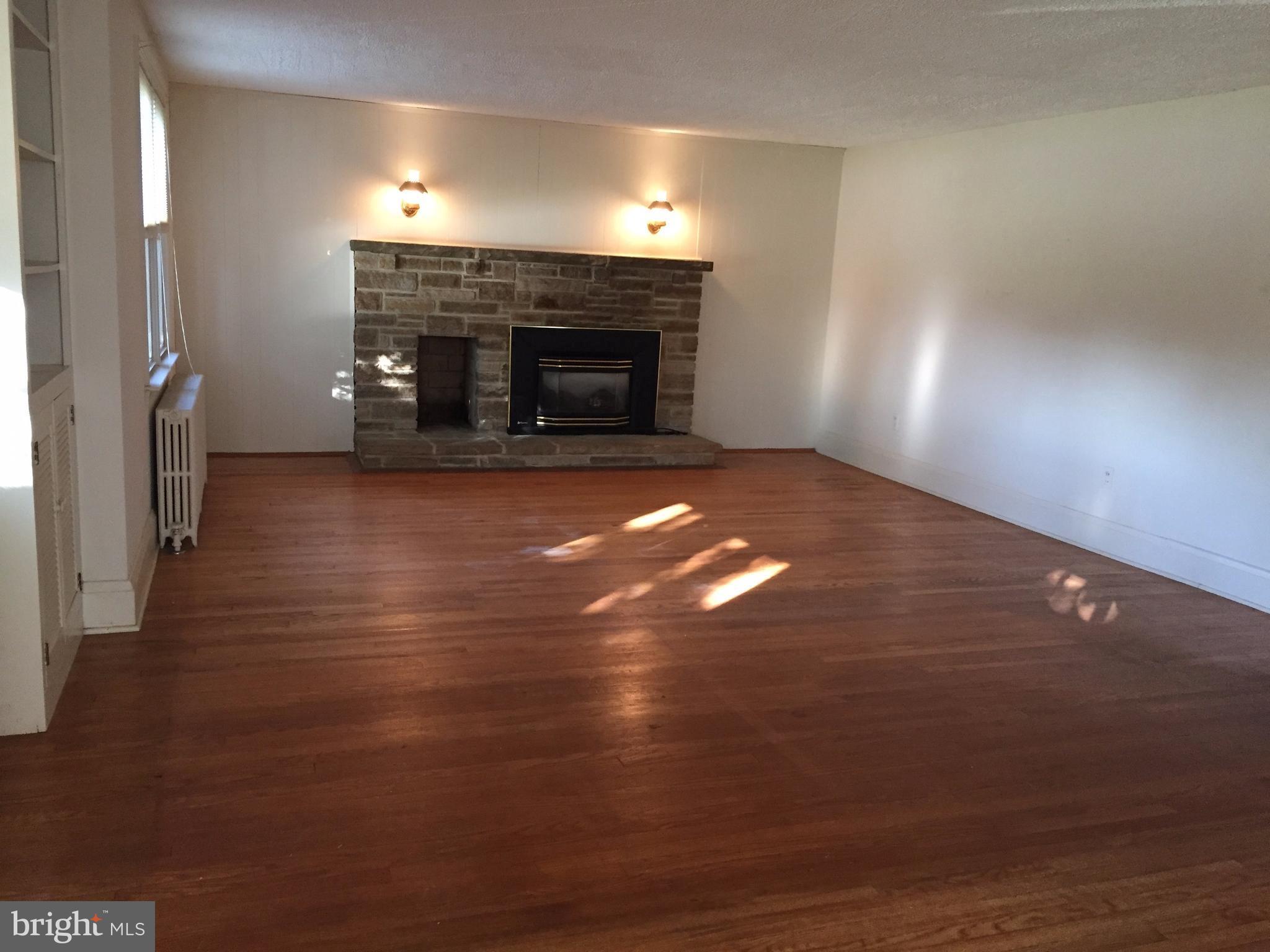 815 Washington Road Westminster, MD 21157 - Photo 2 of 22 Living Room features a gas fireplace