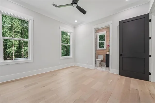 a kitchen with a cabinets and a stove top oven