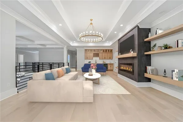 a living room with a furniture and a window
