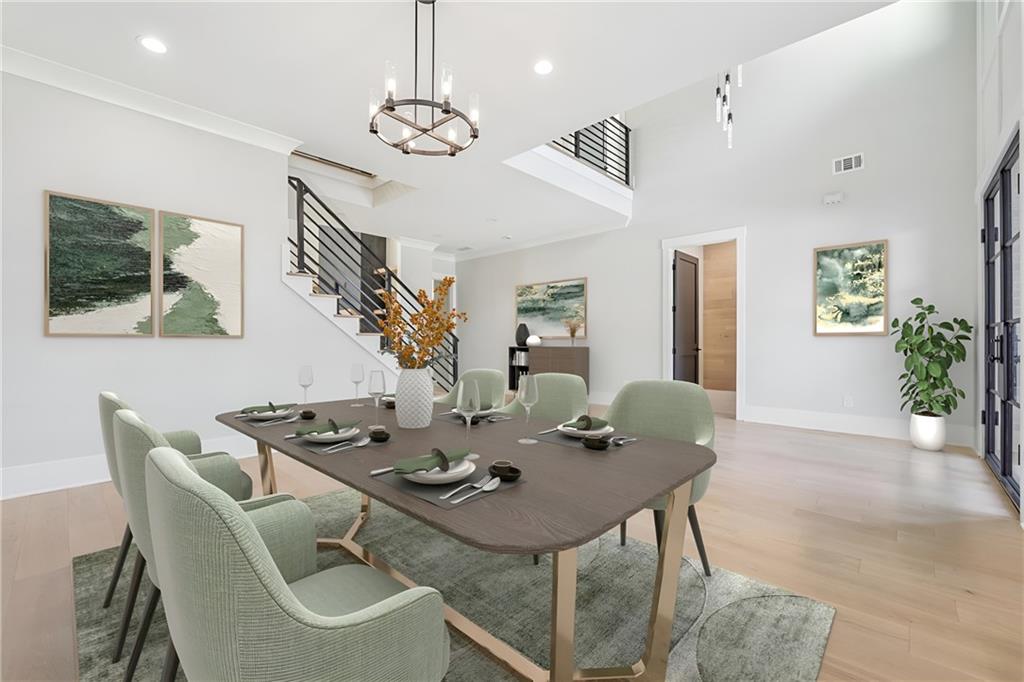 333 Sims Bridge Road Commerce, GA 30530 - Photo 7 of 71 a view of a dining room with furniture and a chandelier