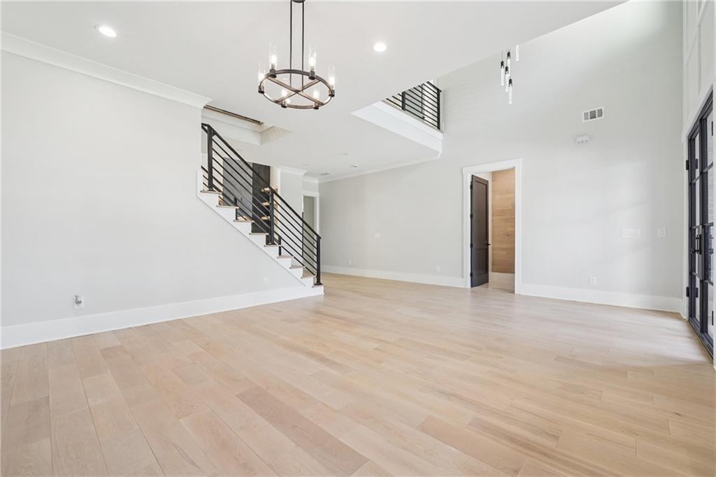 333 Sims Bridge Road Commerce, GA 30530 - Photo 8 of 71 a view of an empty room with wooden floor