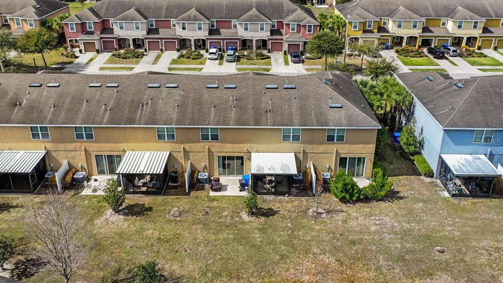 7060 Towne Lake Road Riverview, FL 33578 - Photo 8 of 21 a view of building with cars parked