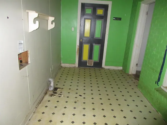 a bathroom with a sink a toilet and a shower
