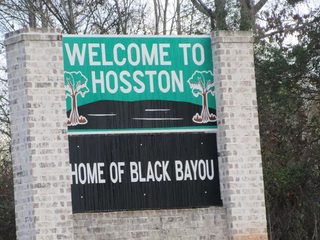 a street sign on a brick wall