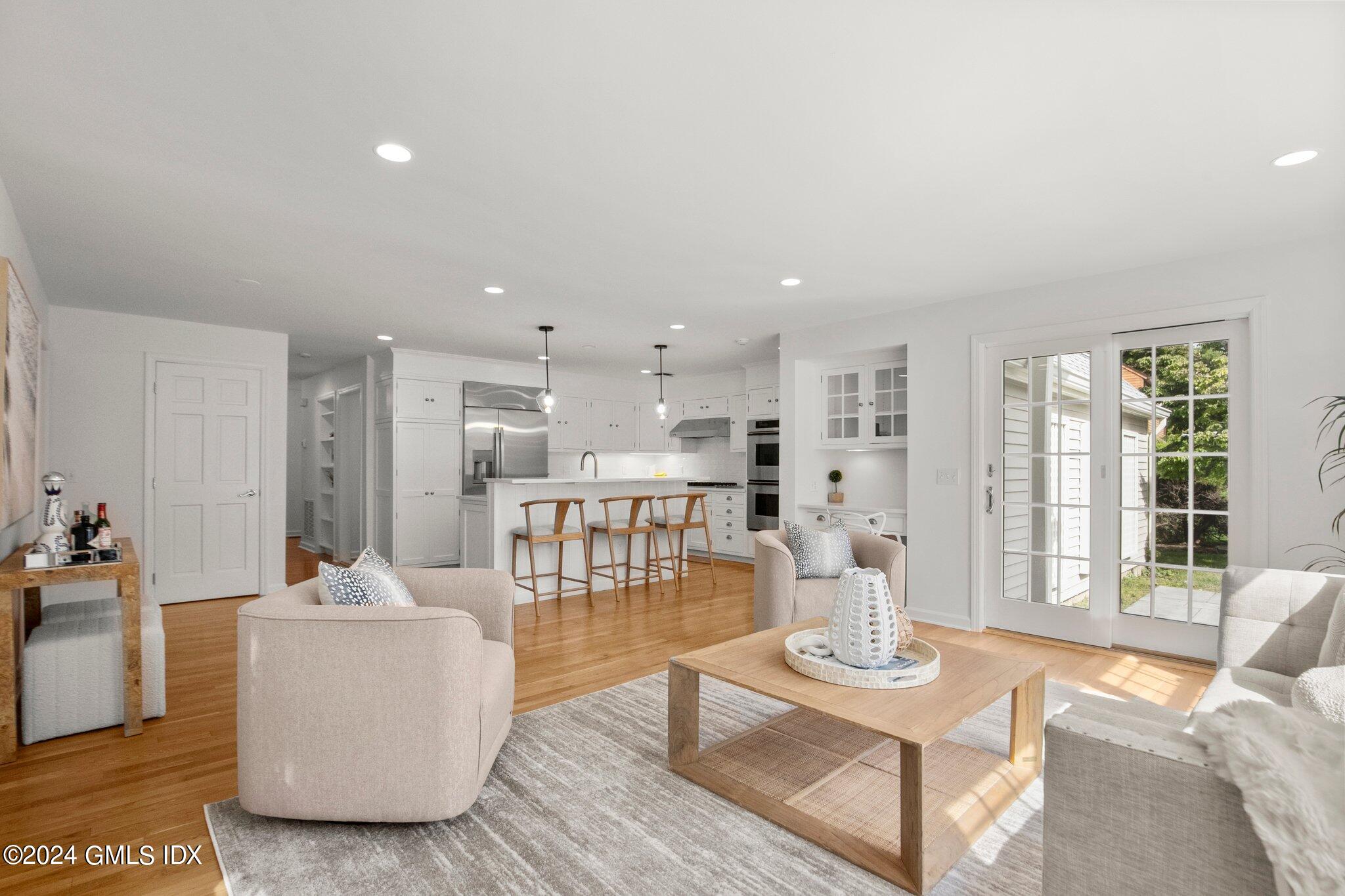 40 Eureka Terrace Stamford, CT 06902 - Photo 11 of 28 a living room with furniture and a table
