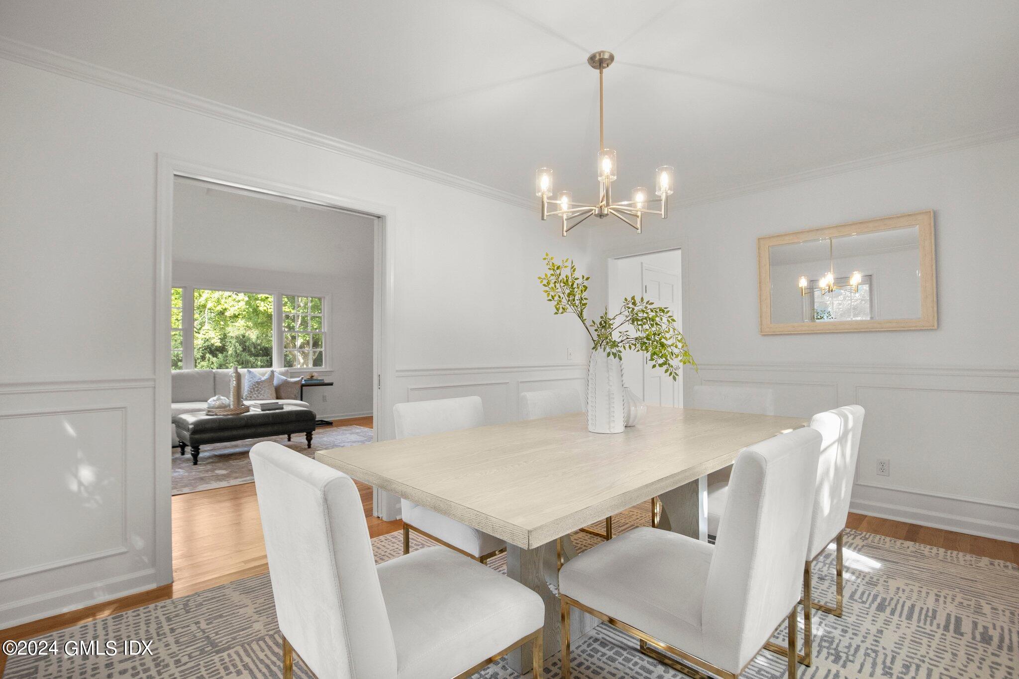 40 Eureka Terrace Stamford, CT 06902 - Photo 12 of 28 a view of a dining room with furniture and chandelier