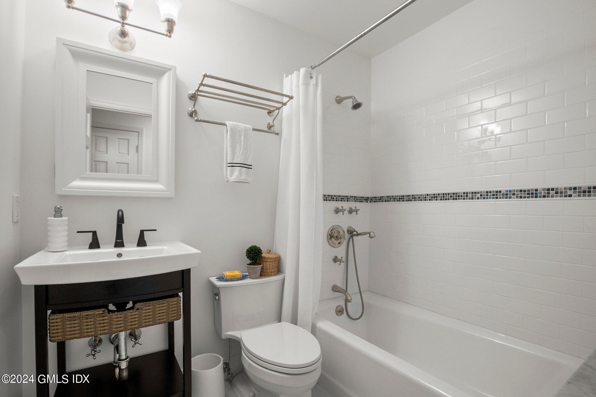 40 Eureka Terrace Stamford, CT 06902 - Photo 17 of 28 a bathroom with a sink toilet and shower