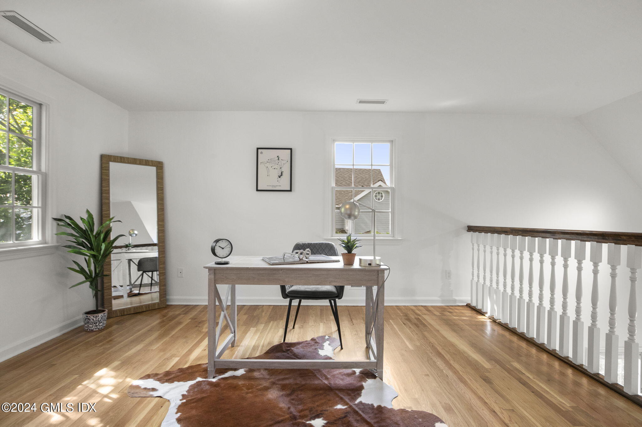 40 Eureka Terrace Stamford, CT 06902 - Photo 18 of 28 a view of a livingroom with furniture window and wooden floor