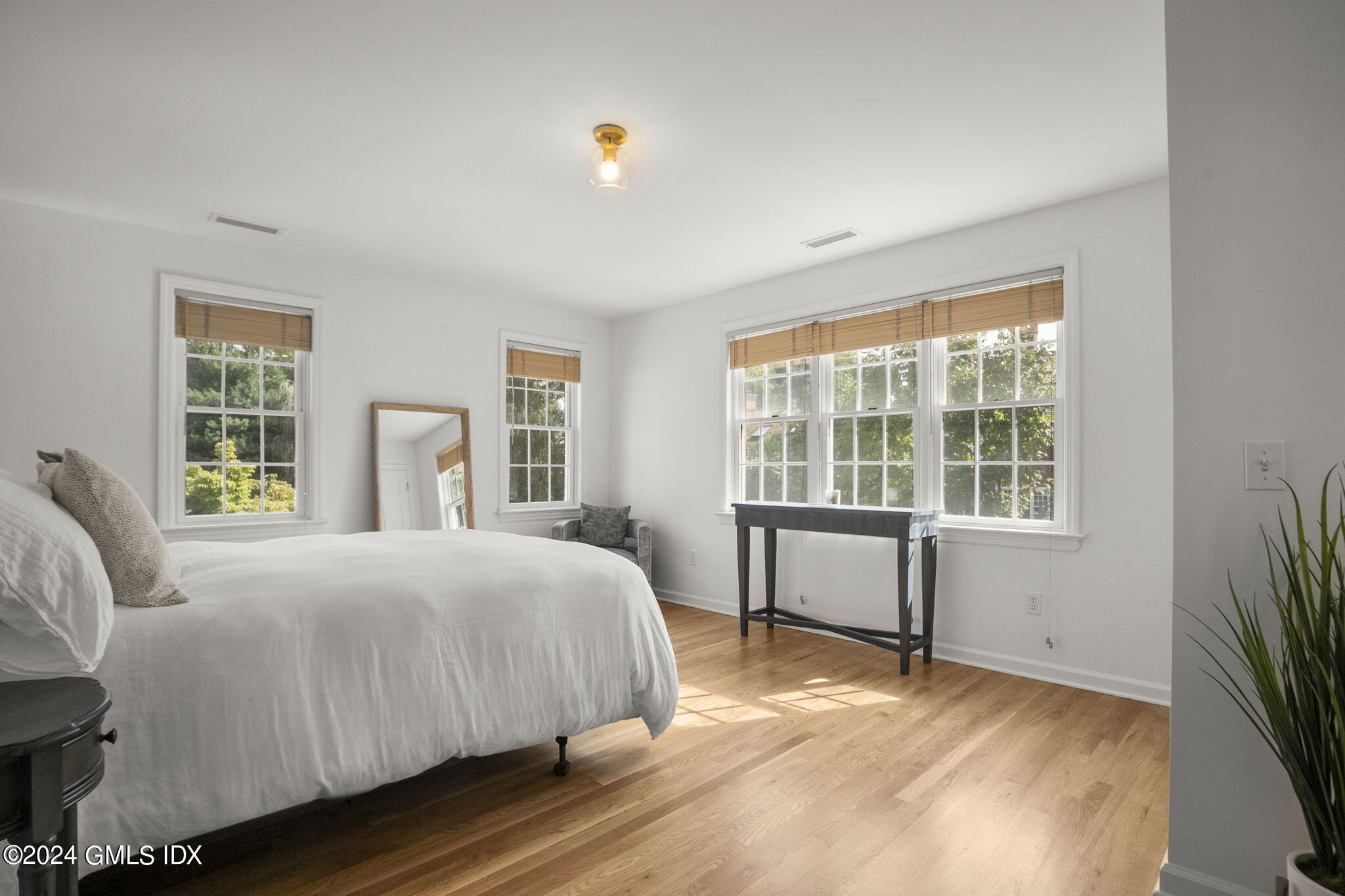 40 Eureka Terrace Stamford, CT 06902 - Photo 19 of 28 a bedroom with a bed and a large window