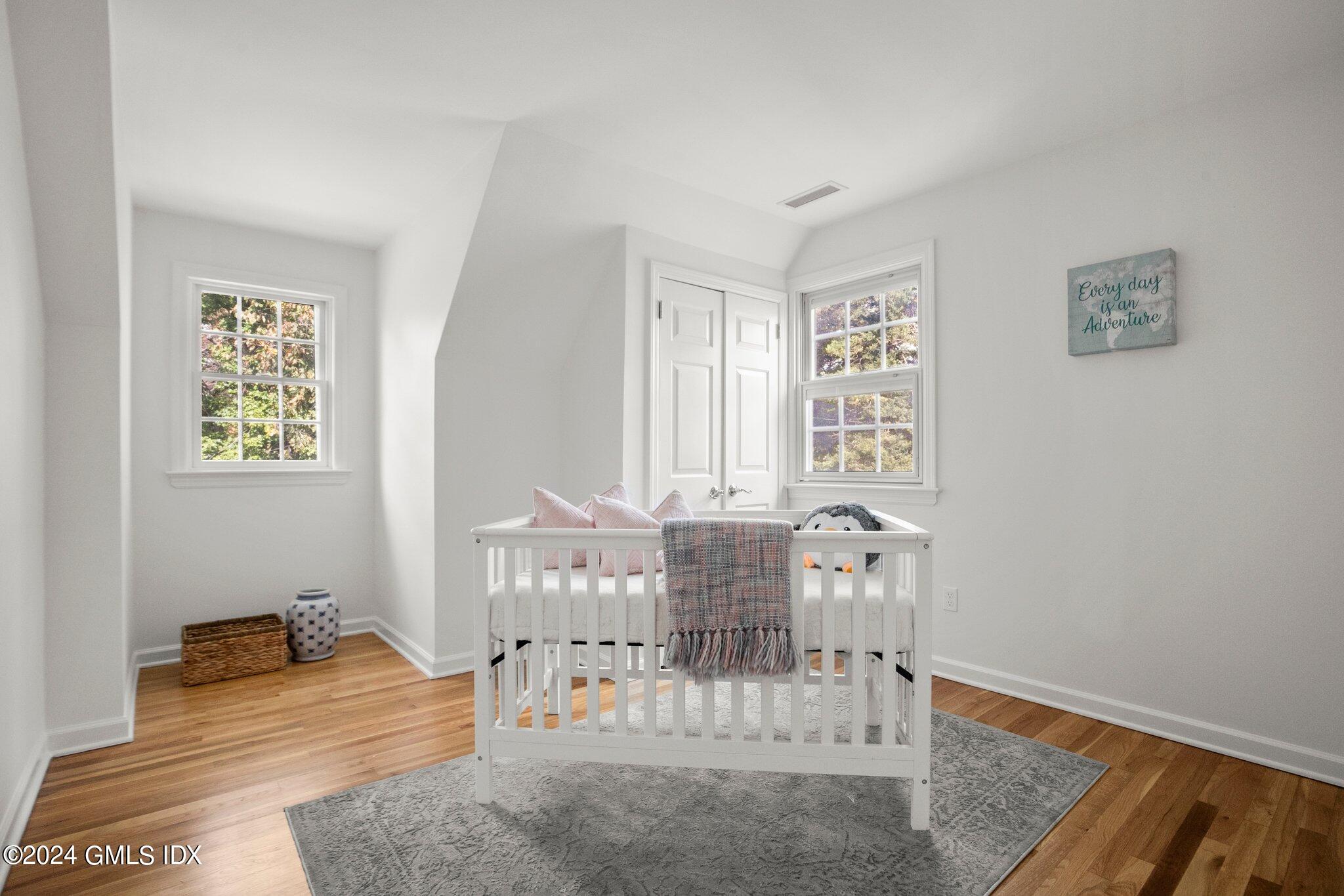 40 Eureka Terrace Stamford, CT 06902 - Photo 20 of 28 a room with table chairs and a window