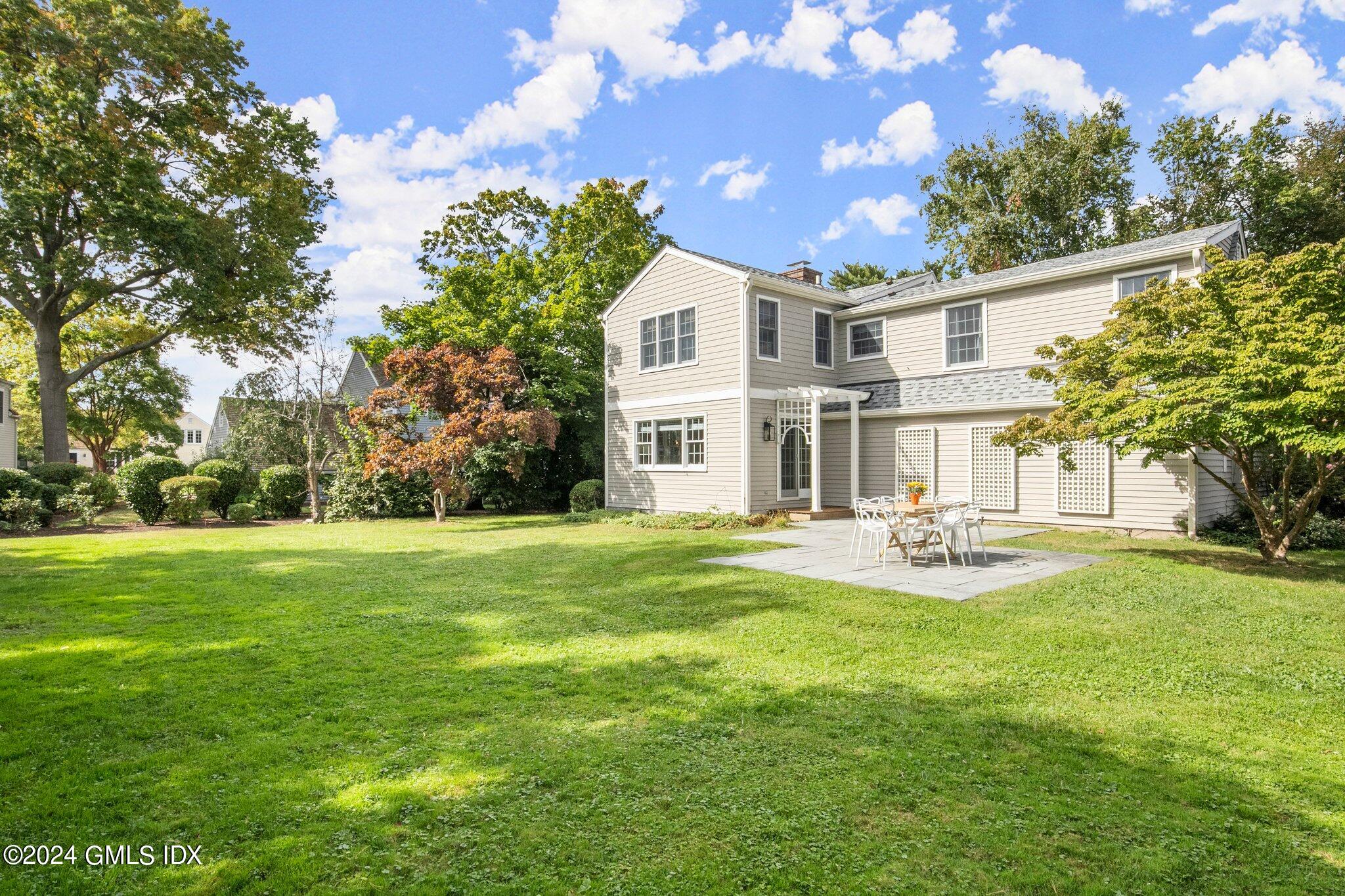 40 Eureka Terrace Stamford, CT 06902 - Photo 25 of 28 a front view of a house with swimming pool having outdoor seating
