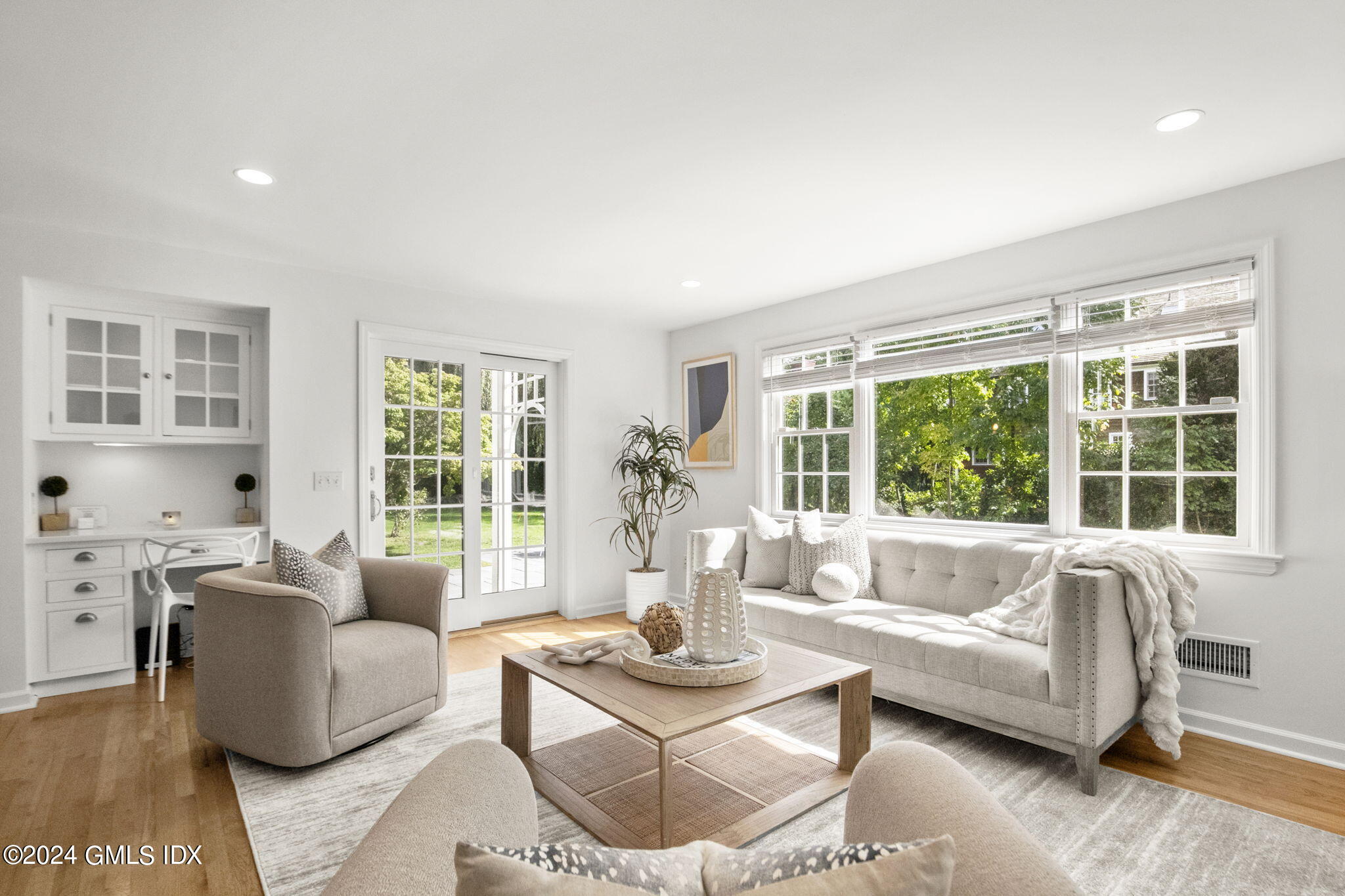 40 Eureka Terrace Stamford, CT 06902 - Photo 8 of 28 a living room with furniture and a large window