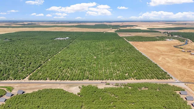 a view of a street with an ocean view