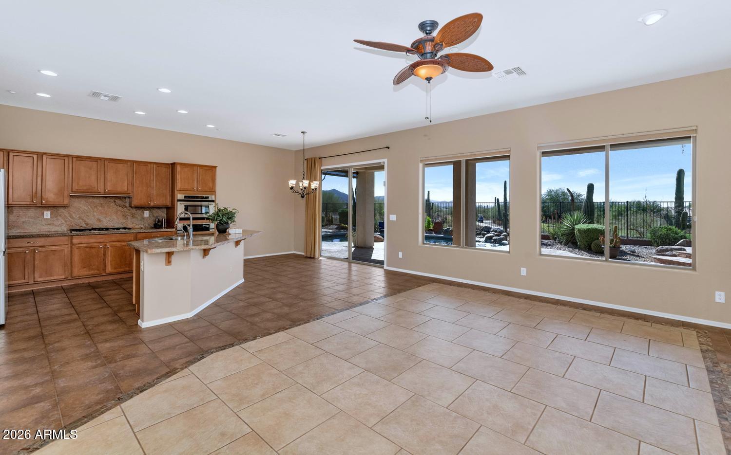 41123 North River Bend Road Phoenix, AZ 85086 - Photo 5 of 45 a view of an kitchen with furniture and windows