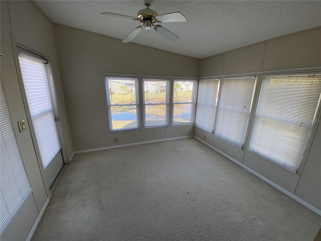 121 Mockingbird Lane Ellenton, FL 34222 - Photo 10 of 24 a view of an empty room with a window