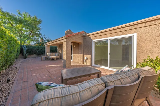 a view of a house with patio