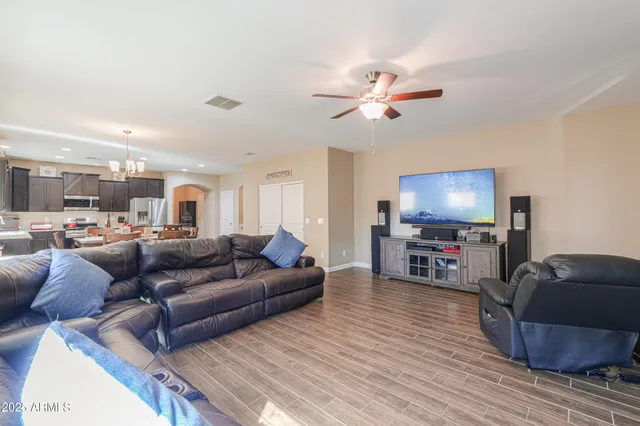 a view of a livingroom with wooden floor