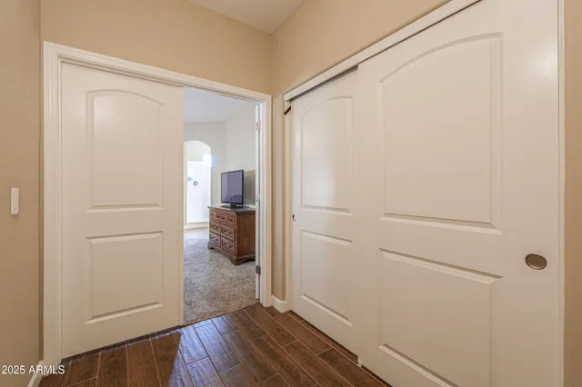 a bedroom with a bed and couch